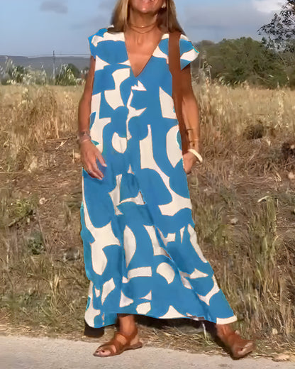 NOVERA™ | Jurk met print en V-hals