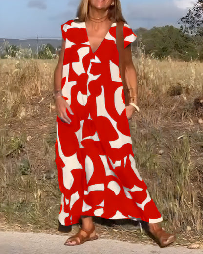 NOVERA™ | Jurk met print en V-hals