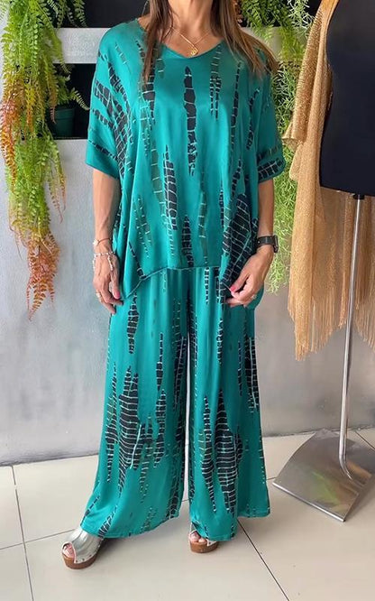 NOVERA™ | Casual tweedelig pak van satijn met ronde hals